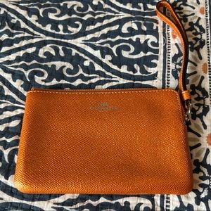 Coach factory orange metallic wristlet